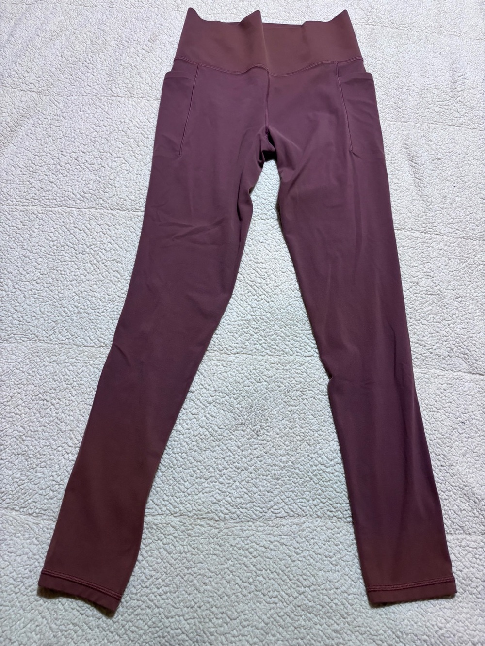 Athleta Salutation Stash Pocket Tight in Plum Brown